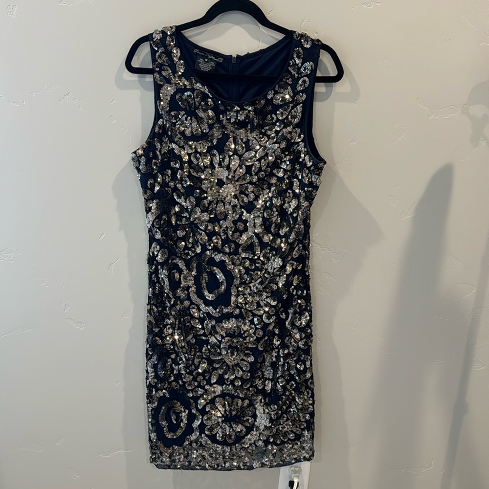 Sparkling navy with gold sequins dress in women’s size 12.  GUC